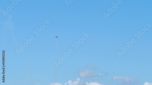 The plane of the Swift aerobatics group, the MiG-29 in the sky performs a stitch. High quality FullHD footage photo