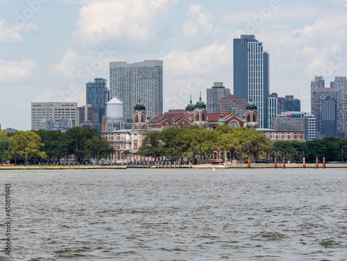 New York, NY - USA - July 30, 2021: Horiontal view of Ellis Island, a federally owned island in New York Harbor that was once the busiest immigrant inspection station in the United States photo