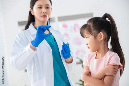 female doctor injection for a girl photo