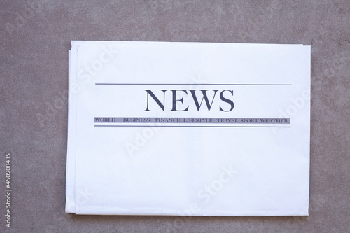 newspaper,newspaper,magazine on gray background,isolated, newspaper 