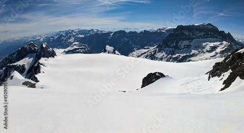 Ski tour on the Clariden mountain, Ski mountaineering with a big panorama mountains. View of the toedi,skitouring winter photo