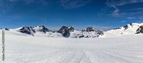 Ski tour on the snow-covered glacier in winter. Hufifirn claridenfirn.Close to SAC Plaruna hut. View of Bocktschingelgrat photo