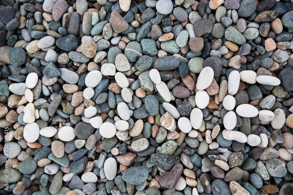 Sea gray stones. Background from sea. Wet gray stones for design. White pebble inscription Love. Sea gray stones. Background from sea. Wet gray stones for design. White pebble inscription Love.