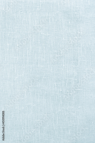 Frosty light blue linen background or texture, pastel fabric, top view