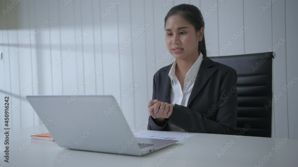 Business concept of 4k Resolution. Asian women are presenting their jobs using computers in the office. Business concept of 4k Resolution. Asian women are presenting their jobs using computers in the office.