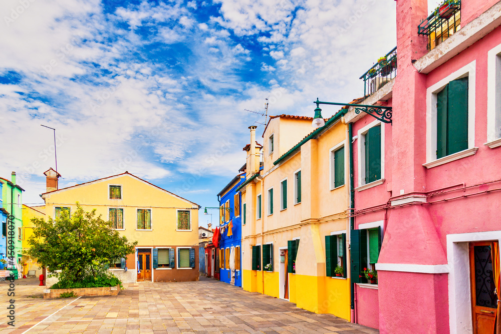Beautiful vibrant colorful houses in Burano, near Venice in Italy.