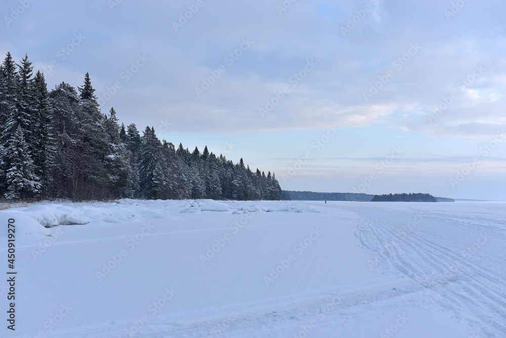 Lake Onega in winter covered with snow