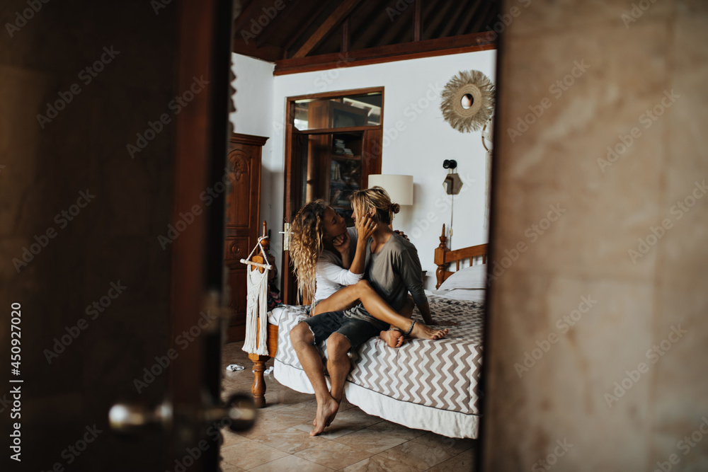 On big soft bed beautiful pair of lovers rests On big soft bed beautiful pair of lovers rests