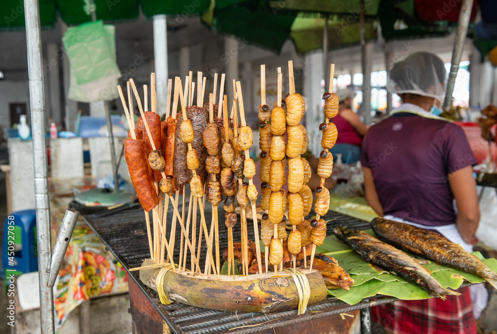 Fried Suri worms Rhynchophorus palmarum on a market in Iquitos, Peru