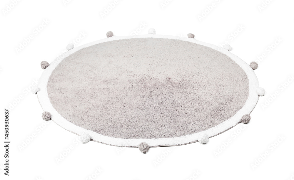 Round rug with pom poms isolated on white Round rug with pom poms isolated on white