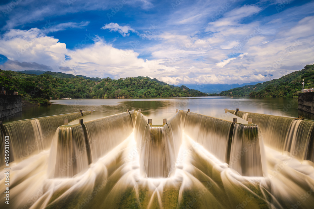 water flows over check dam at Liyutan Reservoir in miaoli, taiwan