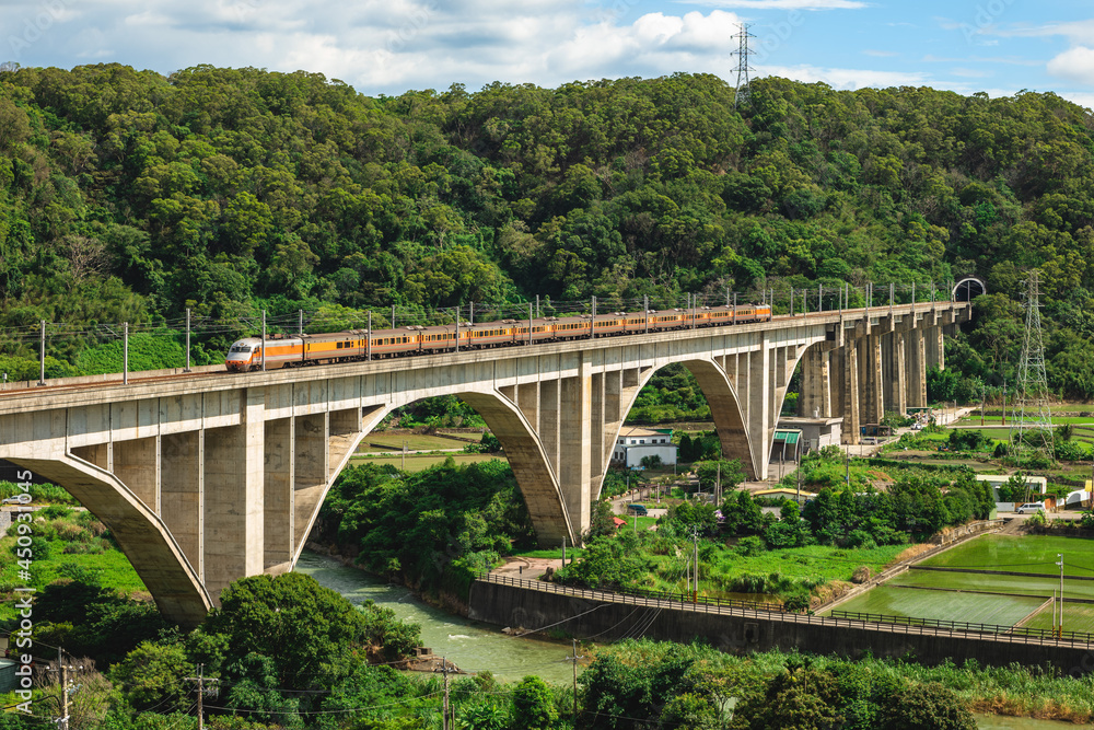A train cross over liyutan arch bridge in miaoli, taiwan A train cross over liyutan arch bridge in miaoli, taiwan