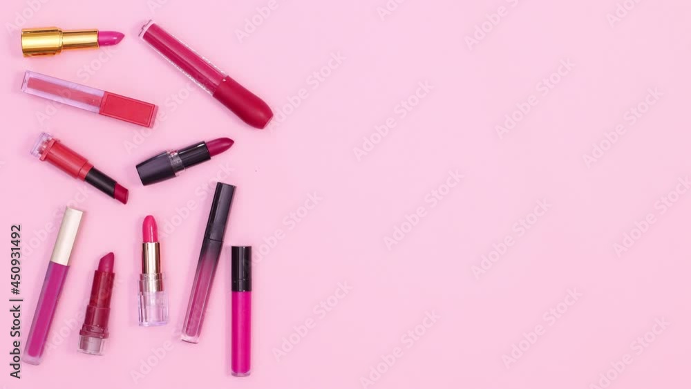 Make up lipsticks appear on pastel pink theme. Stop motion Make up lipsticks appear on pastel pink theme. Stop motion