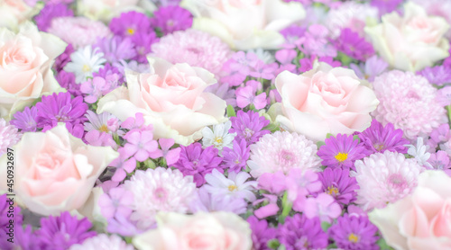 Roses, Mums and Dianthus. Arrangement of pink flowers © hanatopan