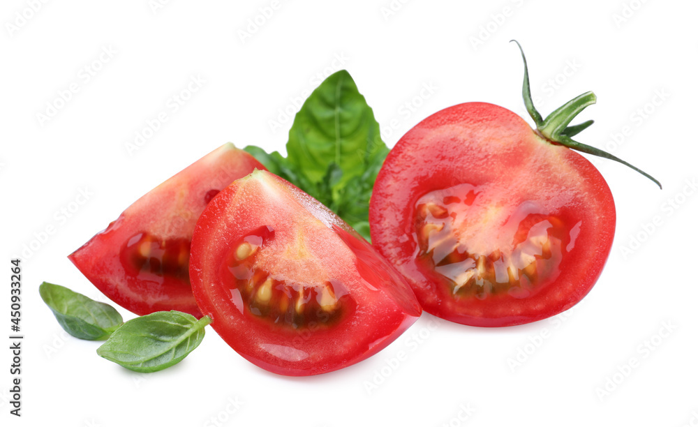 Fresh green basil leaves with cut tomato on white background Fresh green basil leaves with cut tomato on white background