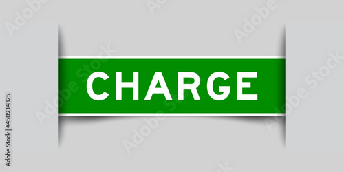 Label sticker green color in word charge that inserted in gray background