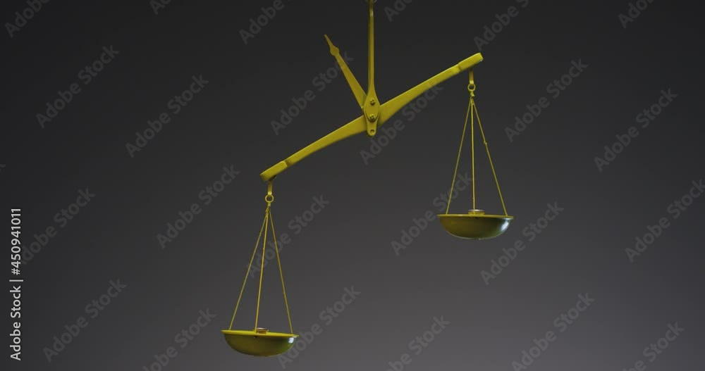 Yellow jewelry retro weigher . The scales are unsteady until they balance . Symbol of justice . Weights on the scales . Studio shot on RED EPIC Cinema Camera with strobe light . Yellow jewelry retro weigher . The scales are unsteady until they balance . Symbol of justice . Weights on the scales . Studio shot on RED EPIC Cinema Camera with strobe light .