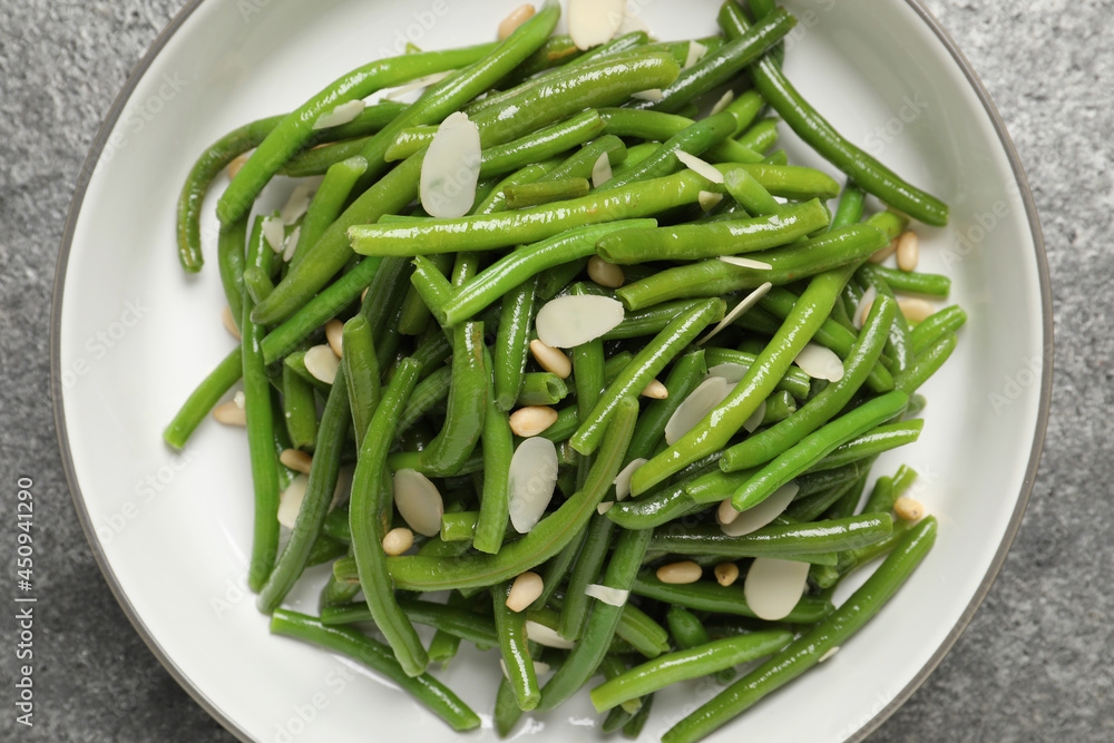 Bowl of tasty salad with green beans on grey table, top view Bowl of tasty salad with green beans on grey table, top view