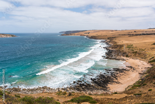 Rough waves crashing against rocks and the beach - Petrel Cove, Victor Harbor, South Australia