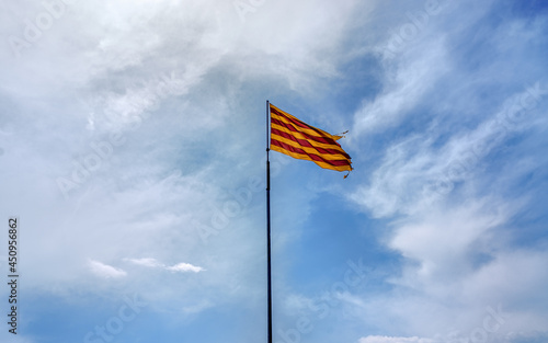 The flag of Catalonia in Spain. Known as the Senyera.