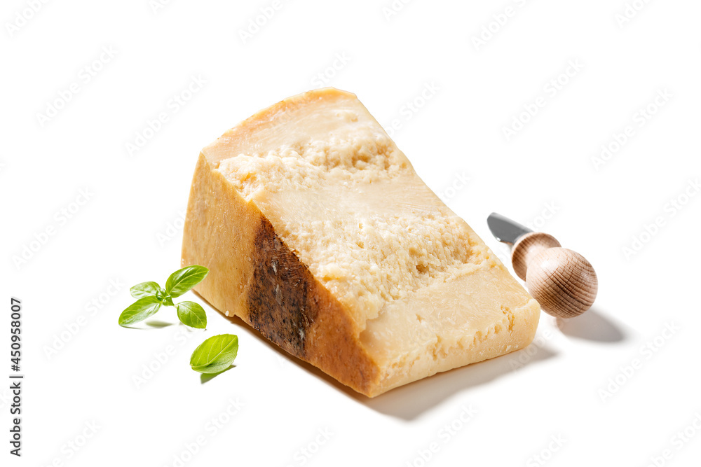 Piece of Parmesan cheese and cheese knife isolated on white background Piece of Parmesan cheese and cheese knife isolated on white background