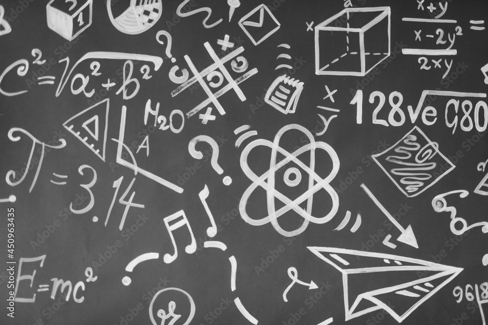 Learning concept. back to school. Background with inscriptions from the school course. Formulas are written on a chalk board. Learning concept. back to school. Background with inscriptions from the school course. Formulas are written on a chalk board.