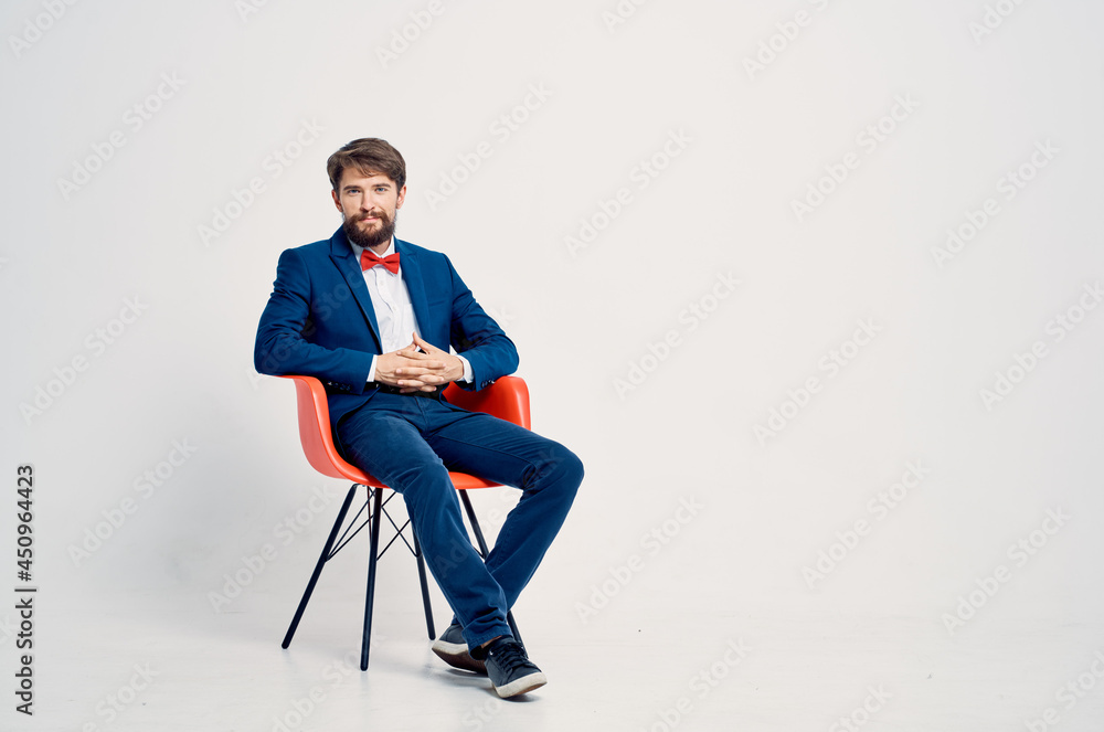 business man sitting on red chair self-confidence manager office business man sitting on red chair self-confidence manager office