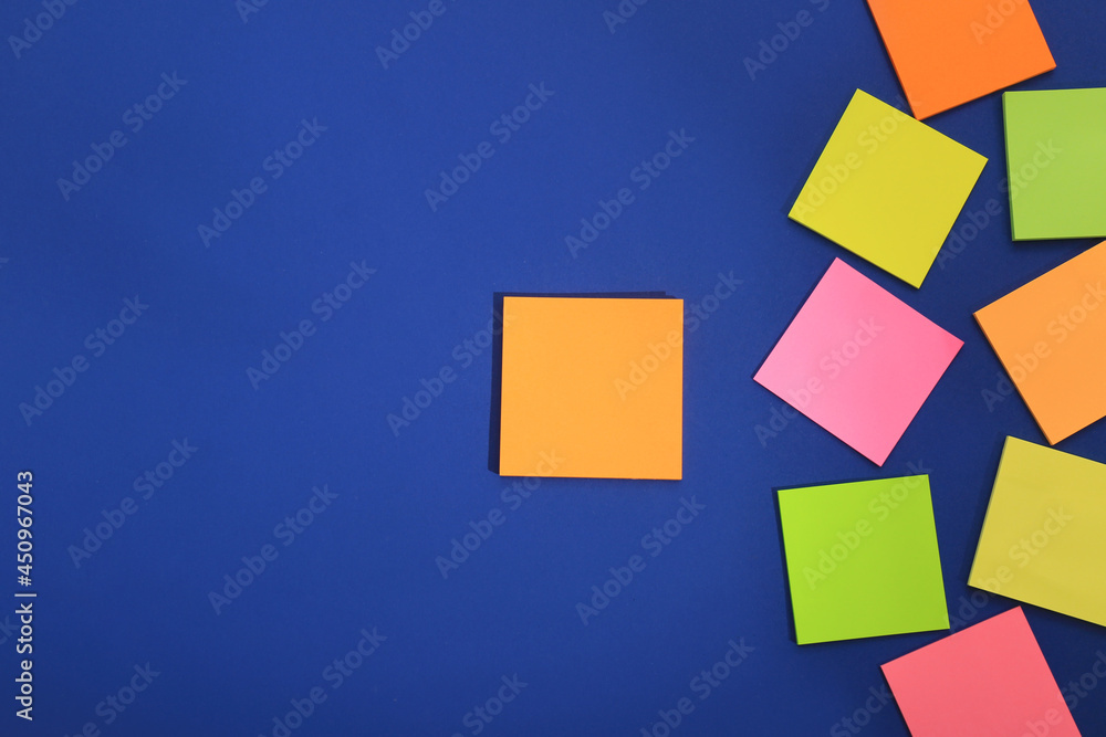 Many colorful stickers on blue background, flat lay. Space for text Many colorful stickers on blue background, flat lay. Space for text