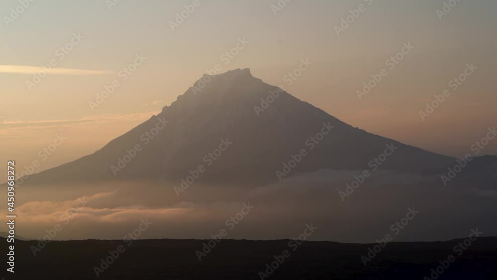 Timelapse video. Sunrise and cloudscape over Tolbachik volcano in Kamchatka in Russia. Timelapse video. Sunrise and cloudscape over Tolbachik volcano in Kamchatka in Russia.