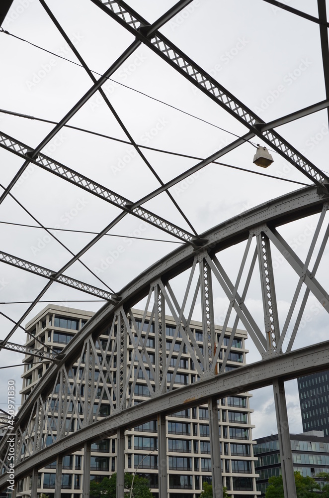 view on modern building from a steel bridge view on modern building from a steel bridge