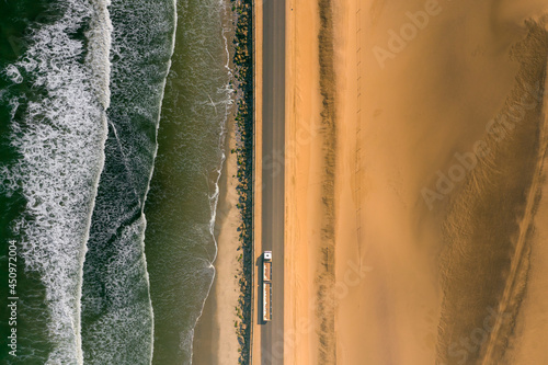 Aerial photo of desert highway. Africa's coastal roads, transport corridors.