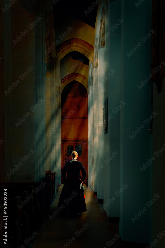 priest in rays of sunlight priest in rays of sunlight