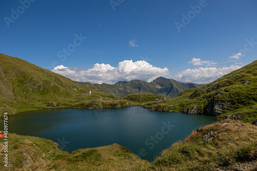 Fototapeta Naklejka Na Ścianę i Meble -  Beautiful landscape over capra lake carpathian mountains fagaras romania