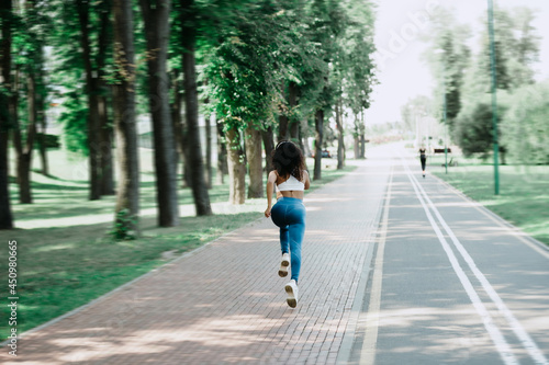 Wallpaper Mural rear view. young woman on a morning jog . Torontodigital.ca