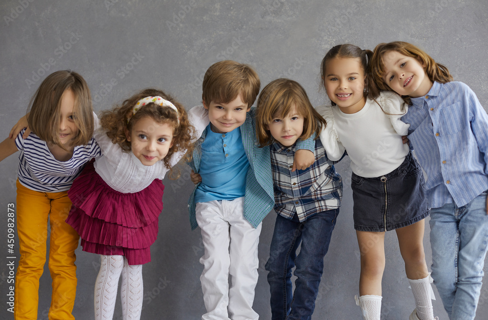 Little friends having fun together. Group portrait of happy young