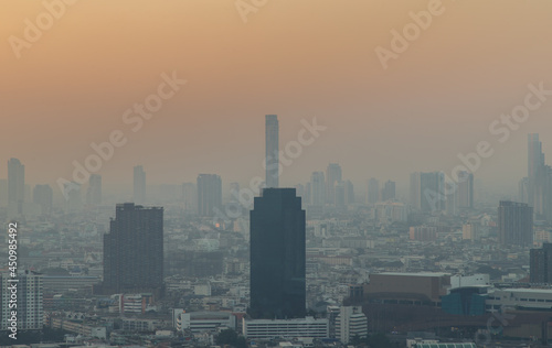 Bangkok, Thailand - Jan 13, 2021 : Aerial view of Beautiful scenery view of Skyscraper Evening time before Sunset creates relaxing feeling for the rest of the day. Selective focus.