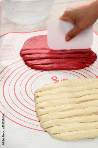 Selected Focus Female Chef Divided Raw Dough Red and White Bread, Process Step by Step Making Chigiri Pan or Japanese Hokkaido Bubble Bread photo