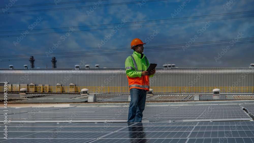 Male solar cell engineer is working hard. Working in alternative energy Solar energy. Engineers in the Solar Energy field
