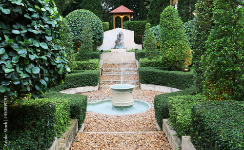 Ancient fountain in the english garden.