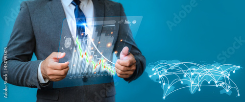 Banner : Businessman concept showing summary of company earning, growth, profit using modern technology on digital screen. businessman hand working with modern screen and business strategy as concept.