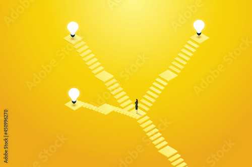 Businessman standing in front of stairs decides which way to up light bulb.