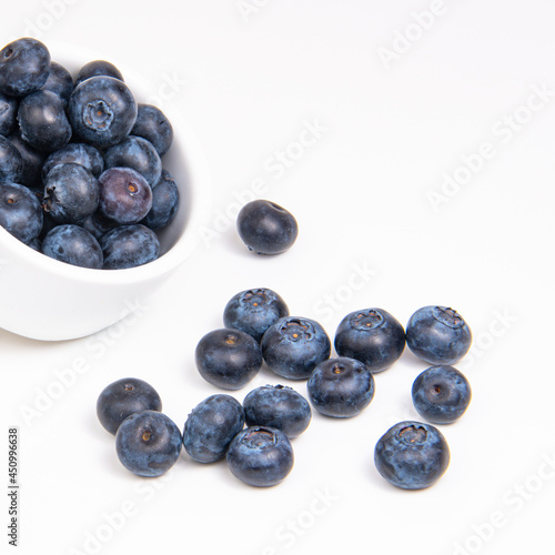 Fresh blueberry in white dish on the white background