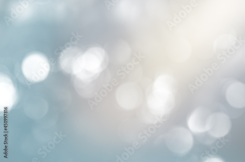 blurry background with round particles in blue shades