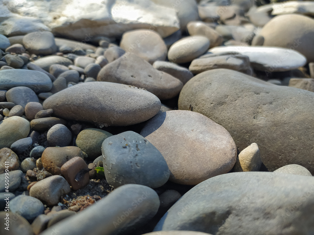 abstract background with round pebble stones. Vacation holiday recreation on beach. abstract background with round pebble stones. Vacation holiday recreation on beach.