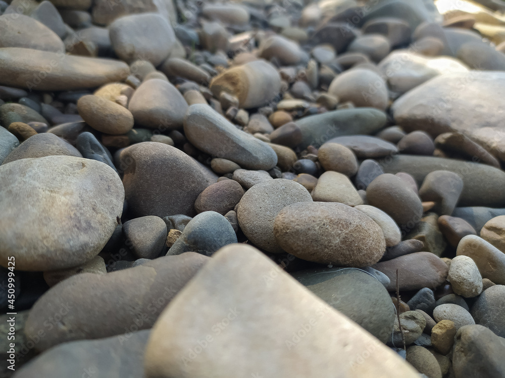abstract background with round pebble stones. Vacation holiday recreation on beach. abstract background with round pebble stones. Vacation holiday recreation on beach.