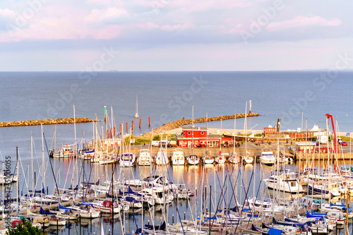 View on harbor of German touristic city resort Damp on Baltic sea. Panoramic view on sailing boats. photo