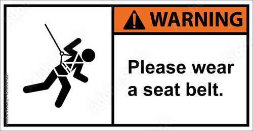 Please wear a safety harness to prevent falls from a height.Warning sign.