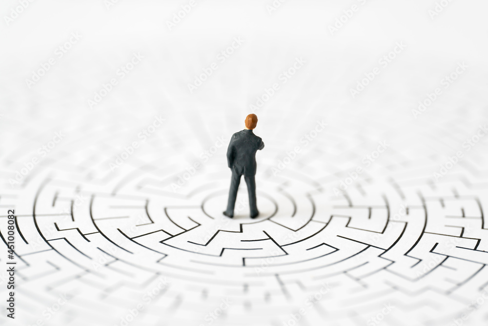 Miniature Business people office man stand center of maze thinking business plan and how to solve problem using for Accounting Financial Banking business growth development and Commerce Strategy Plan Miniature Business people office man stand center of maze thinking business plan and how to solve problem using for Accounting Financial Banking business growth development and Commerce Strategy Plan