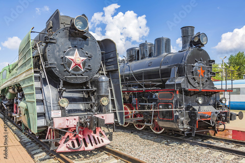Rare black retro steam locomotive. Exposition area of RZD railway vehicles at Rizhskaya station Moscow, Russia