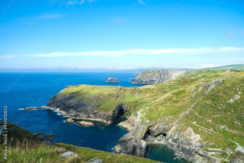 Beautiful landscape on the cost of Cornwall. Family vacations in England on the ocean.